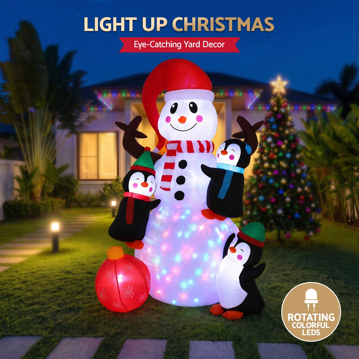 Inflatable snowman with multicolor LED lights, red hat, scarf, and penguin yard figures