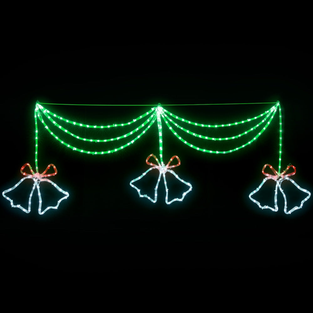 Green LED curtain light with three bell-bow motifs and red ribbon accents