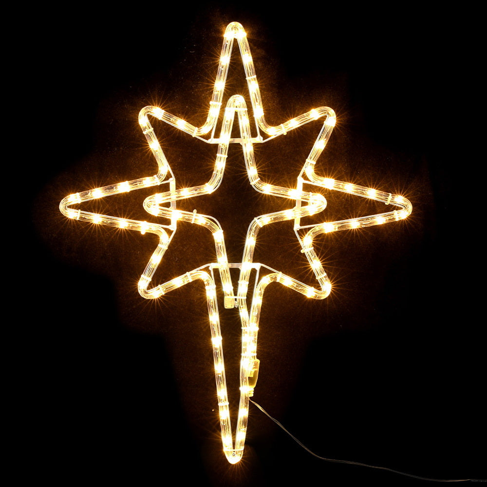 Glowing Bethlehem star Christmas light with warm-white LED bulbs and clear tubing
