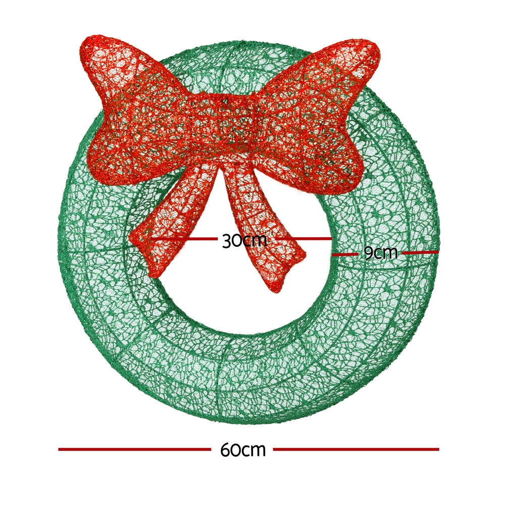 Solar LED wreath, green mesh ring with red glitter bow; 60cm diameter, 9cm bow