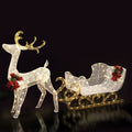White glitter reindeer and gold sleigh decoration with red bow details and warm LED lights