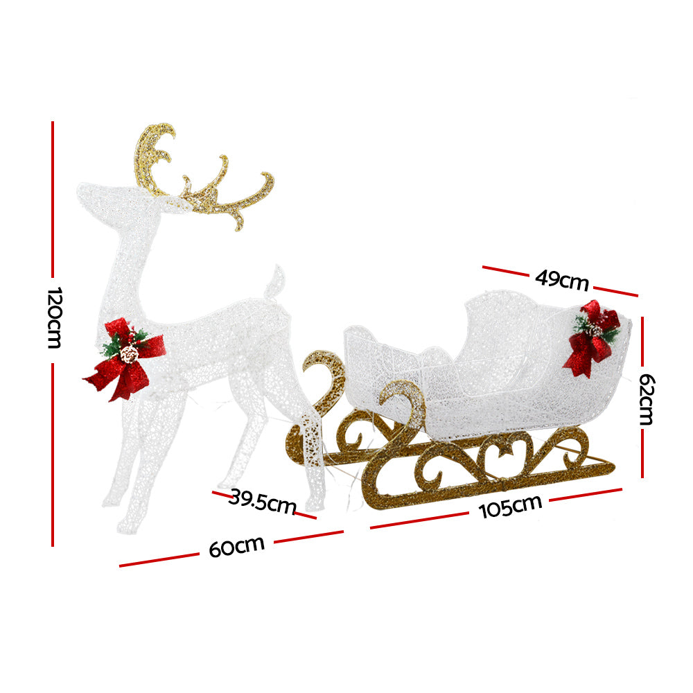 Christmas reindeer and sleigh LED decoration, white and gold glitter with red bows (size shown)