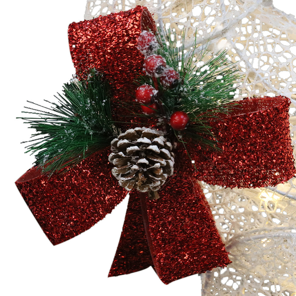 Red bow wreath-style detail on red glitter ribbon, attached to white snowflake mesh decoration