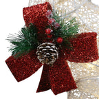 Red bow wreath-style detail on red glitter ribbon, attached to white snowflake mesh decoration