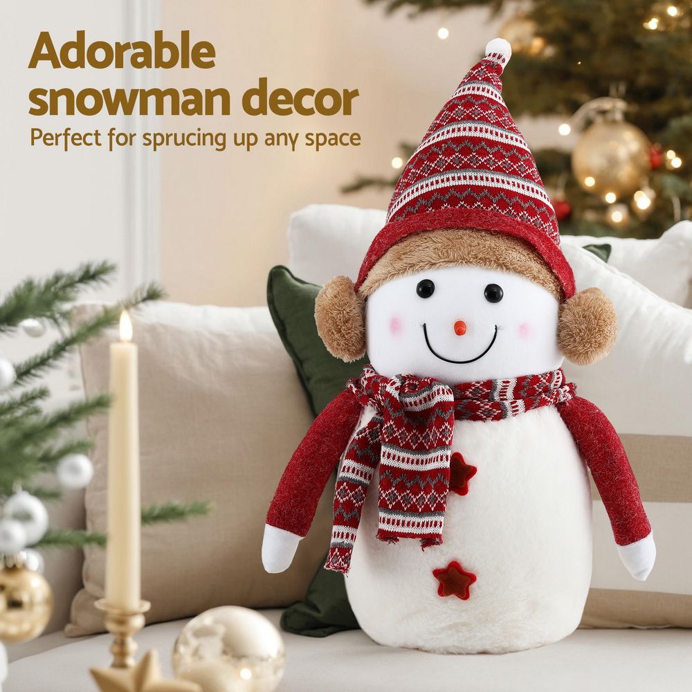 Plush red-and-white snowman tabletop decoration sitting pose, knit hat and scarf