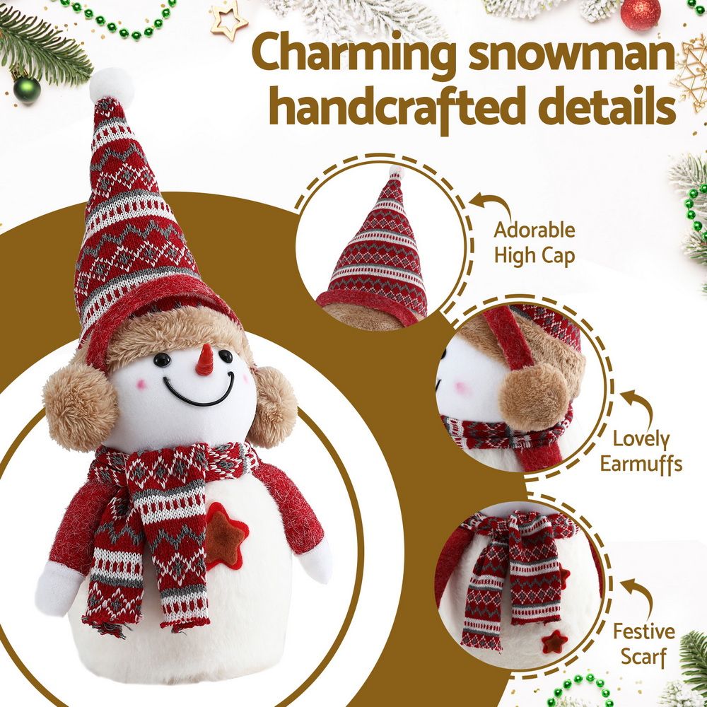 Plush snowman decoration with red-and-white knitted cap, scarf, and fluffy earmuff sides